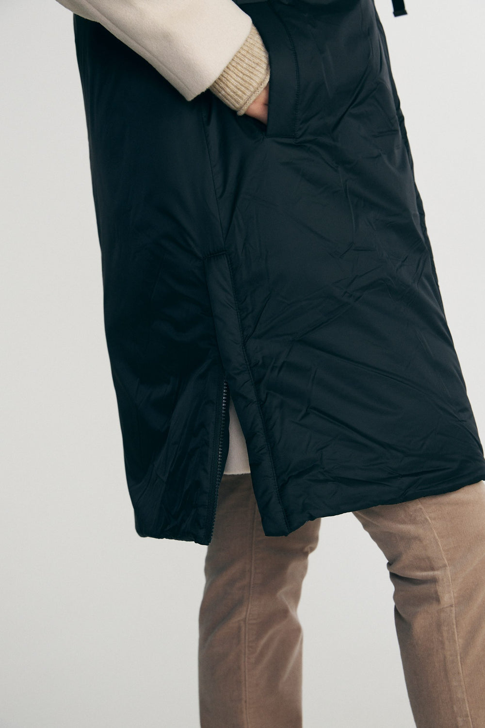 Manteau matelassé sans manche à capuche