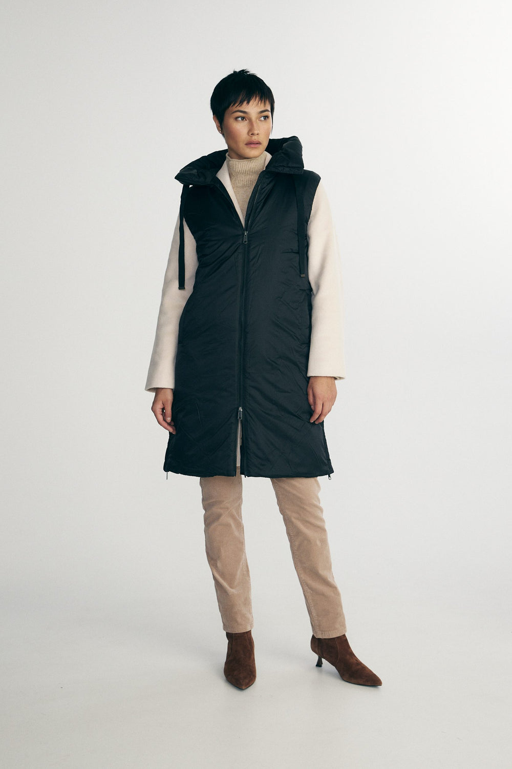 Manteau matelassé sans manche à capuche