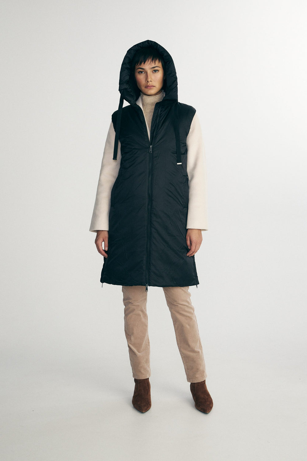 Manteau matelassé sans manche à capuche