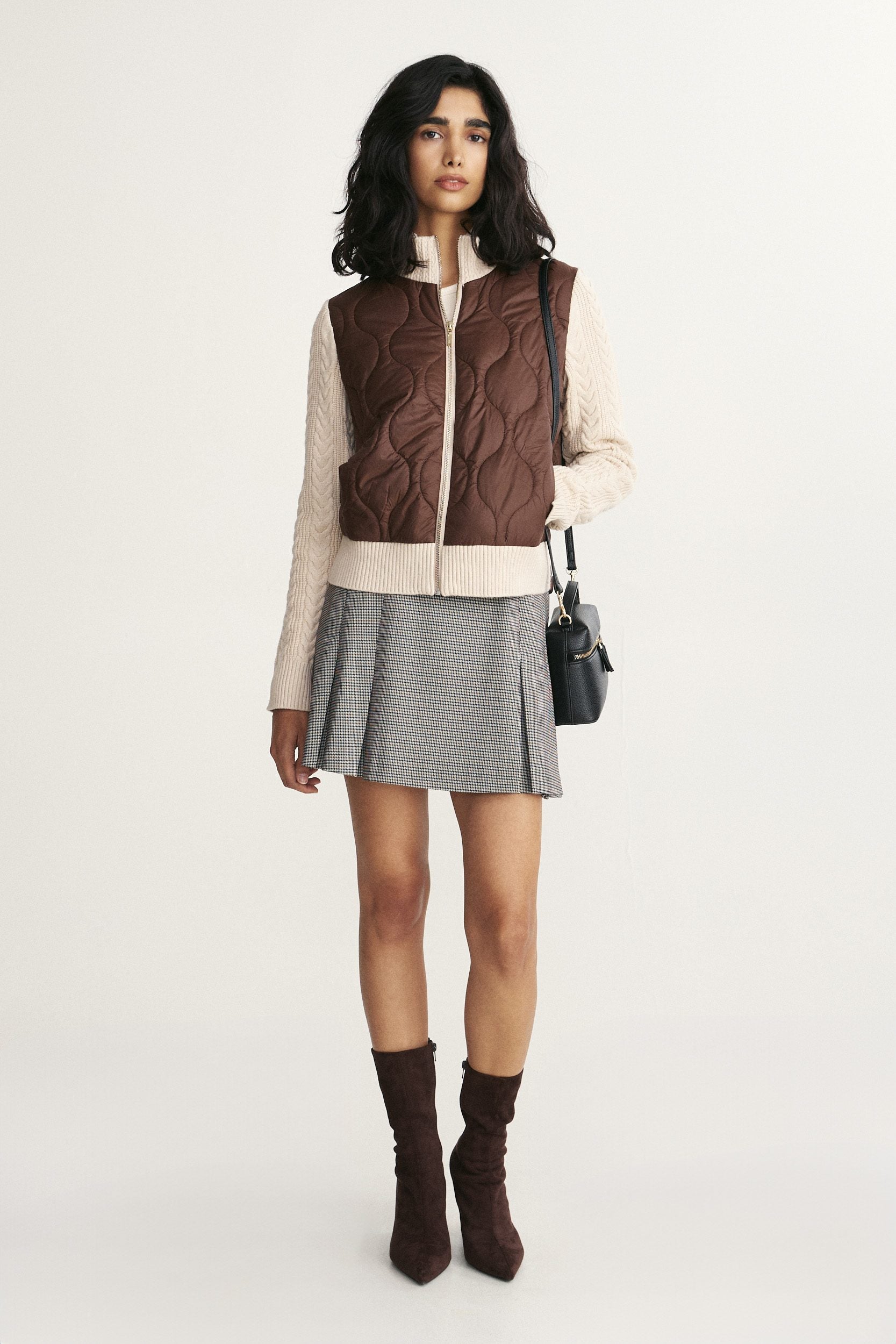 Knitted sleeves quilted jacket