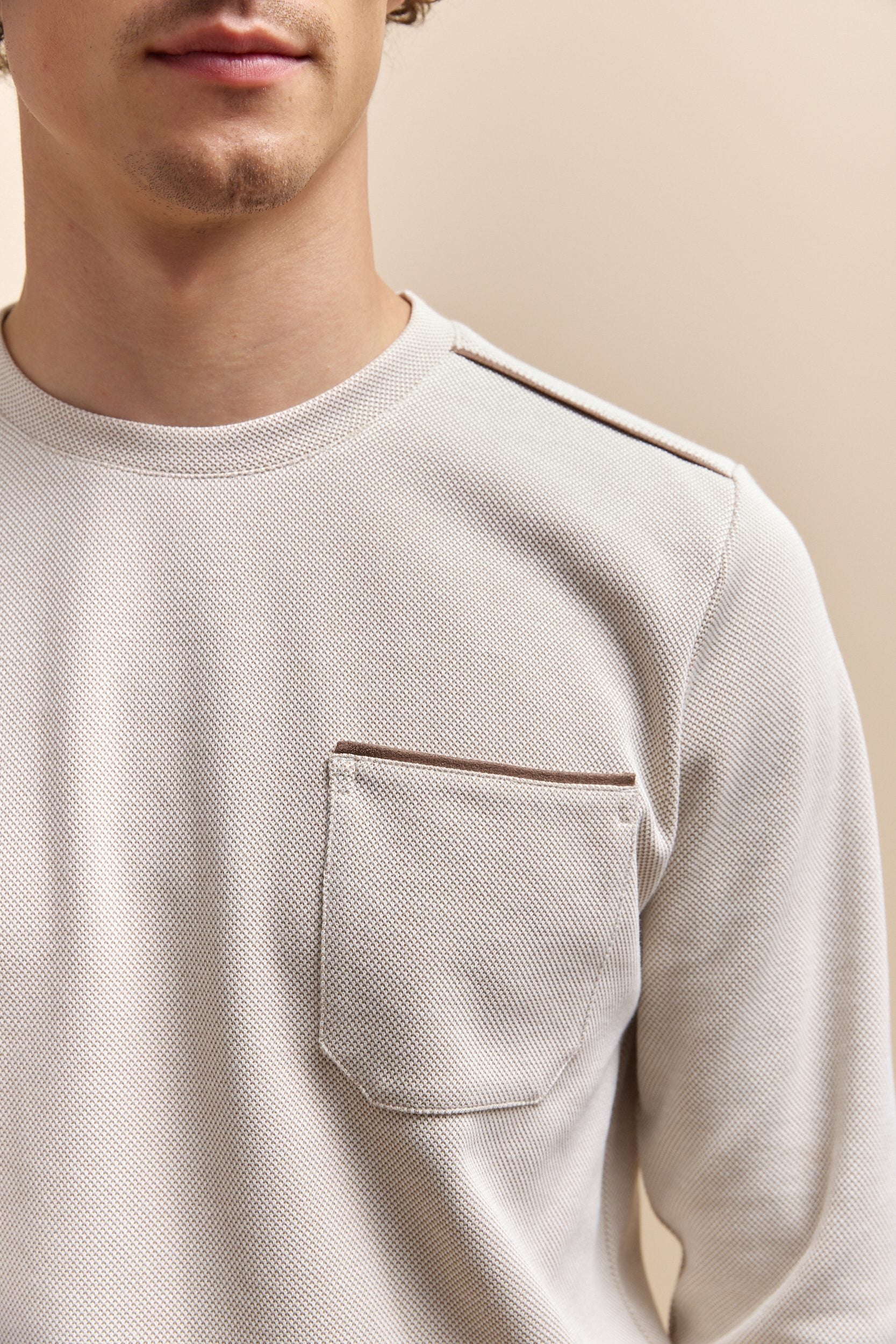 Chandail texturé détails de faux suède