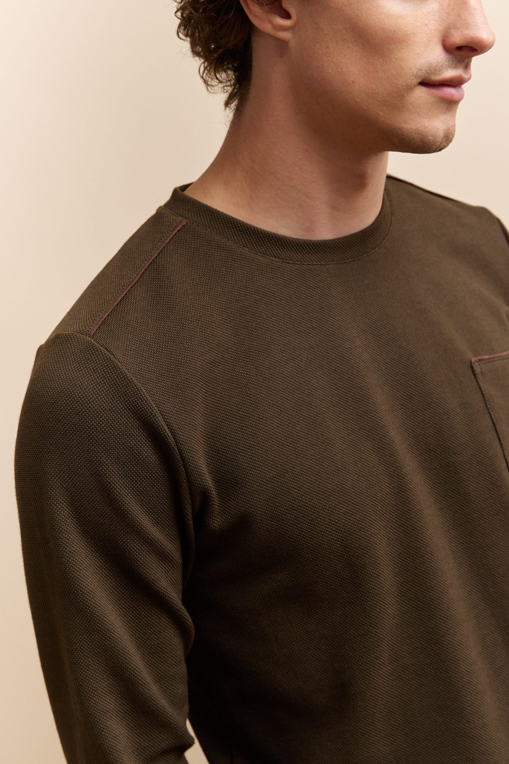 Chandail texturé détails de faux suède