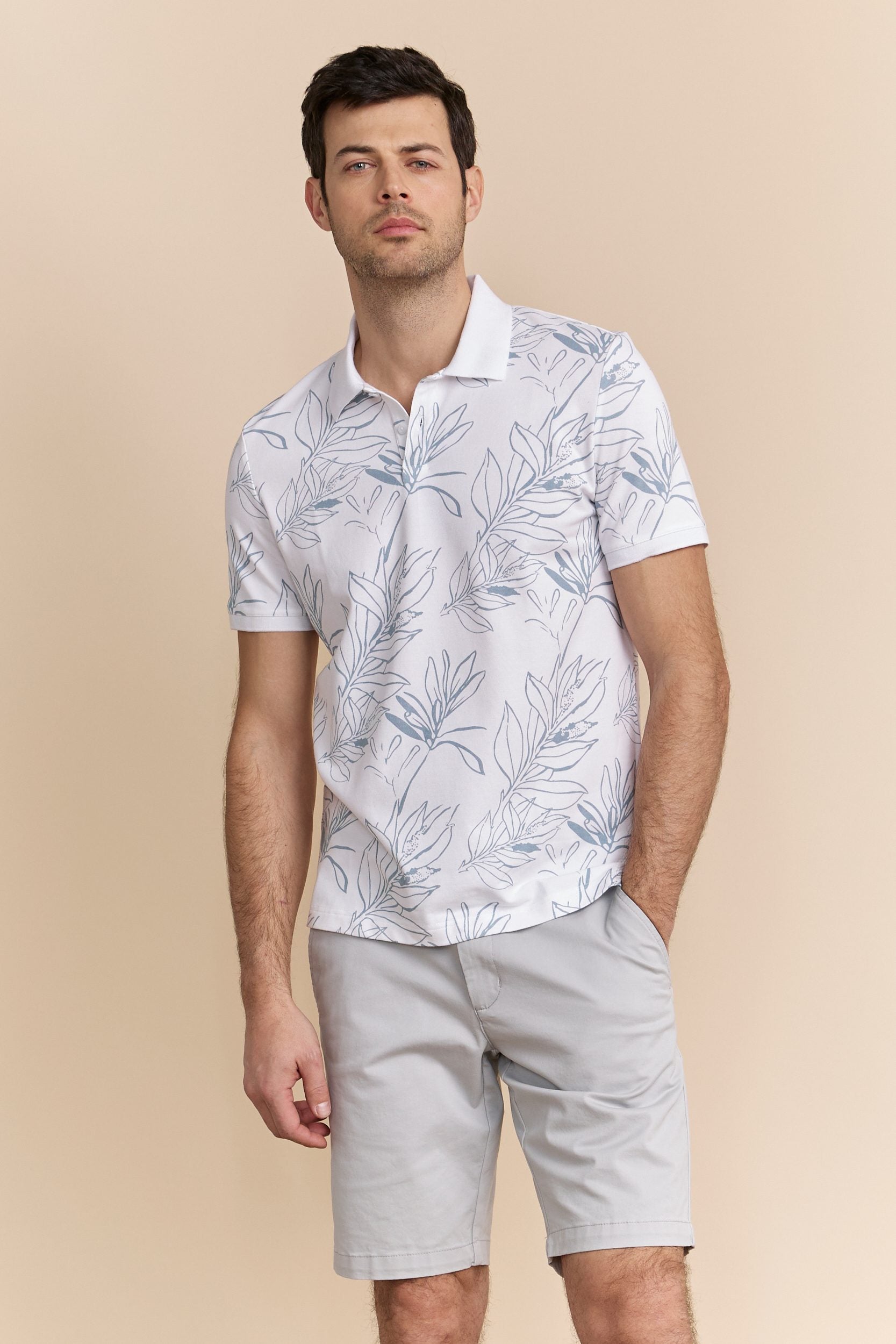 Polo imprimé feuillage