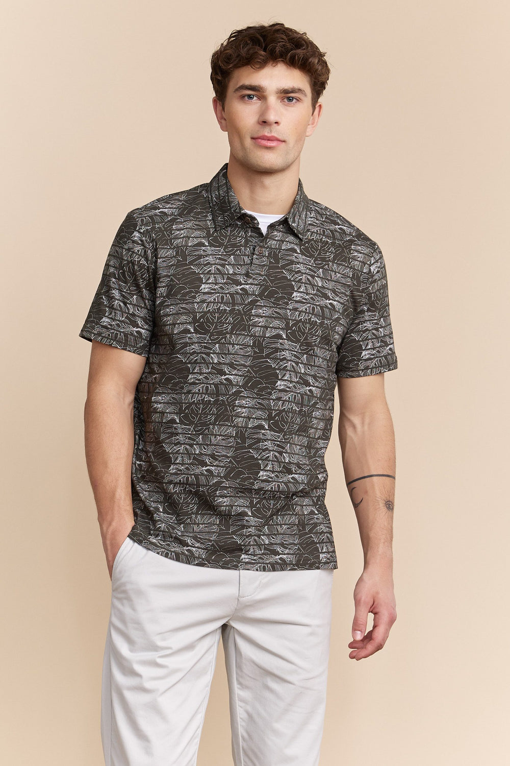 Tropical print stripped polo
