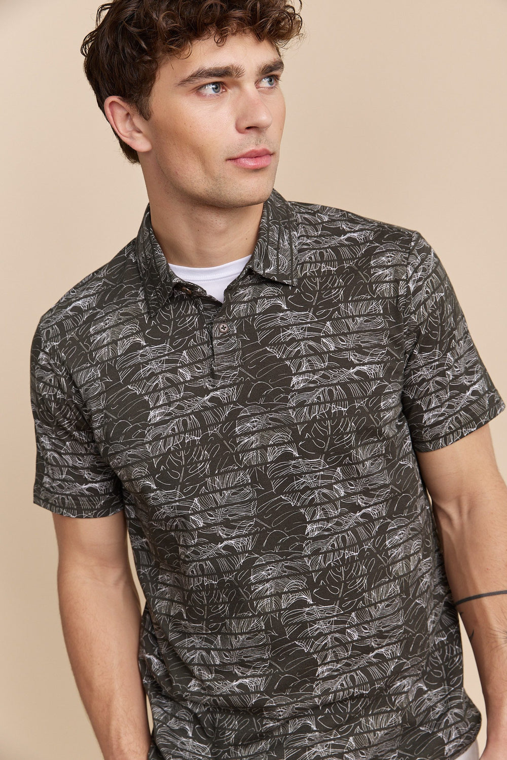 Tropical print stripped polo