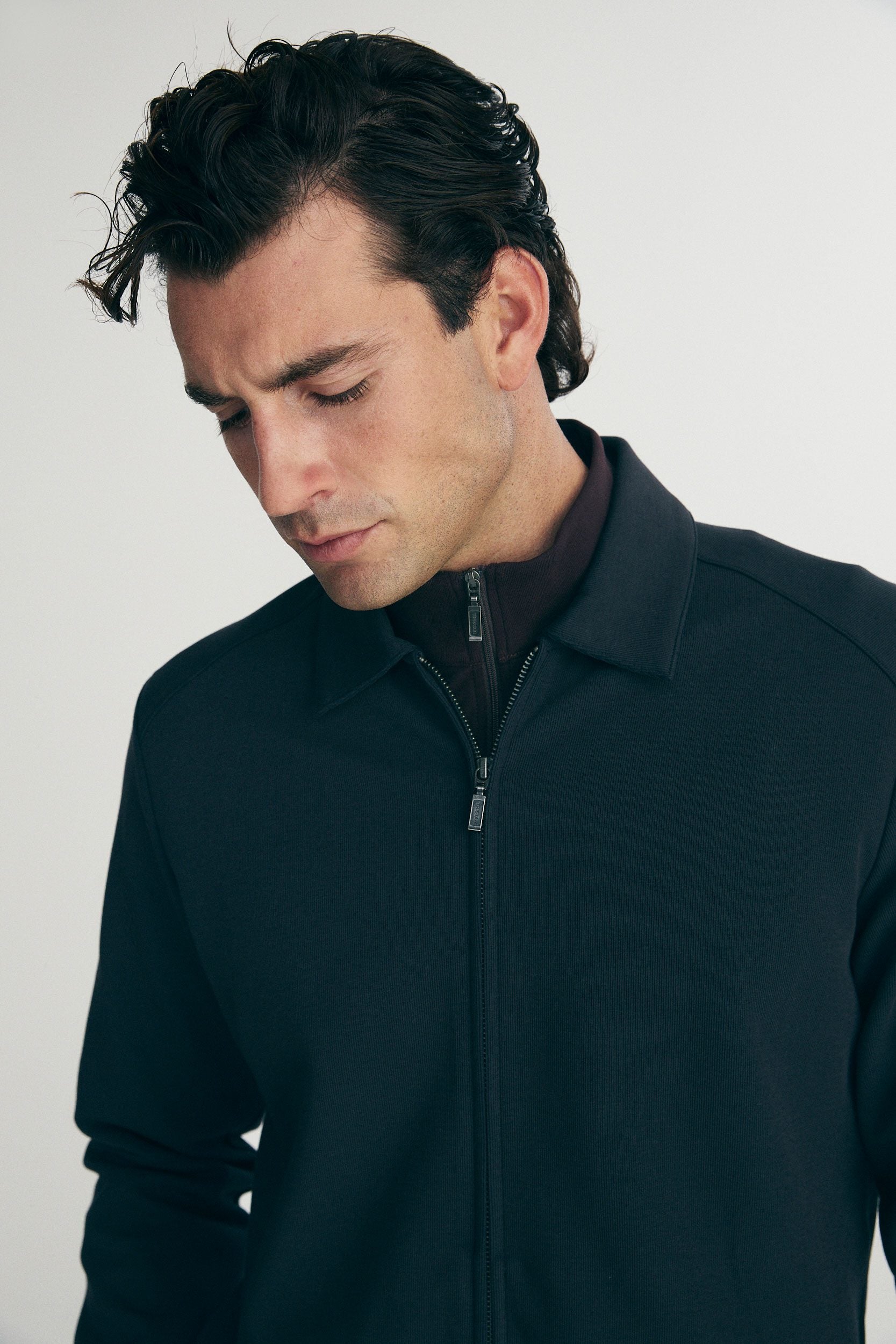 Cardigan with zip and side seam pockets