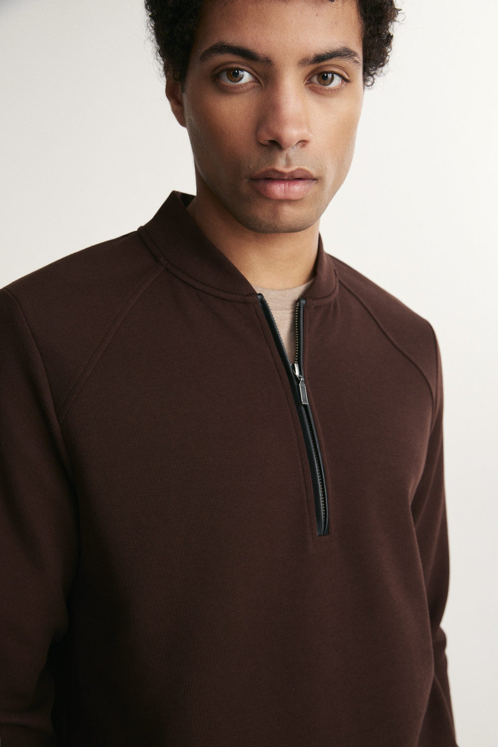 Textured half zip mockneck sweater