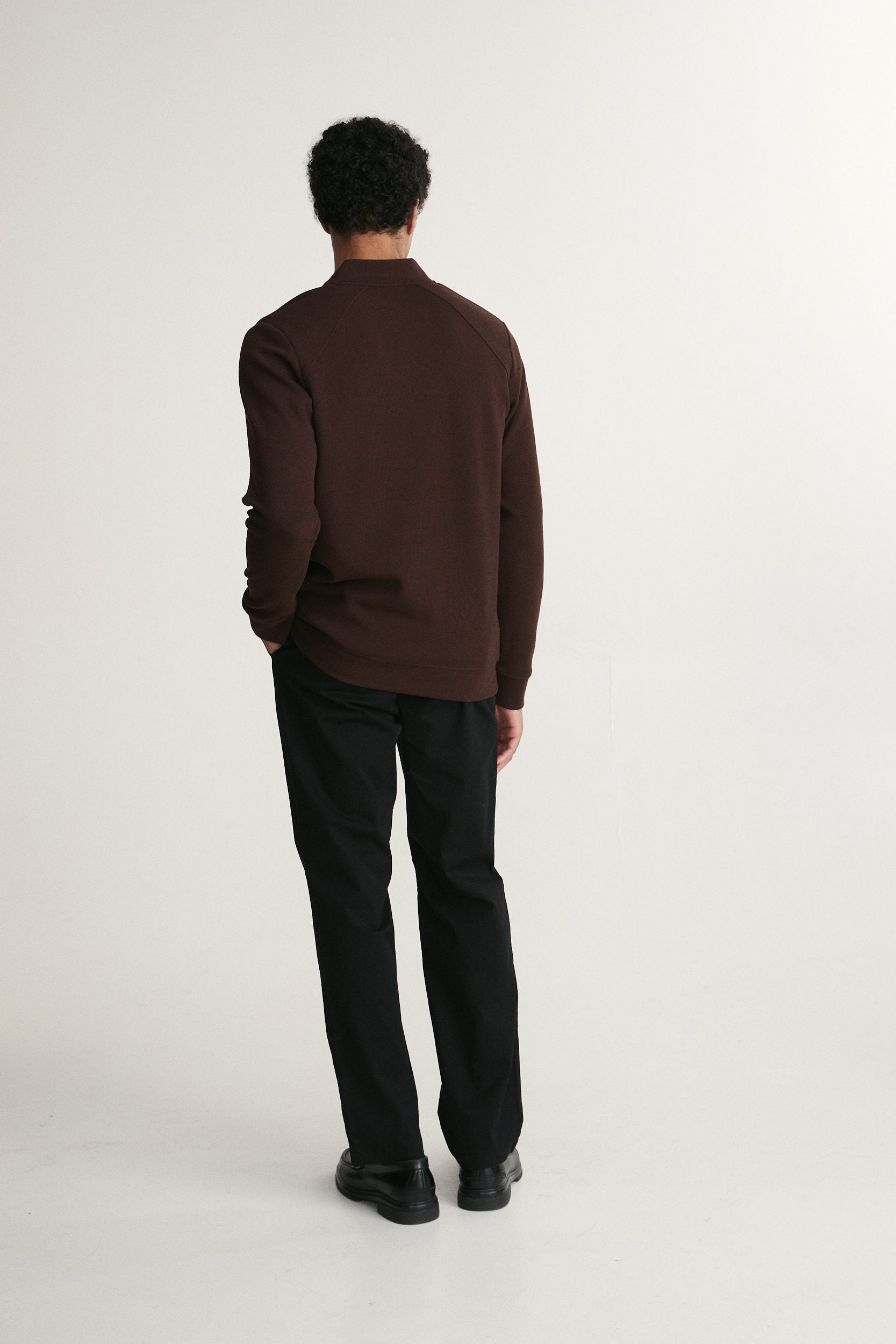 Textured half zip mockneck sweater