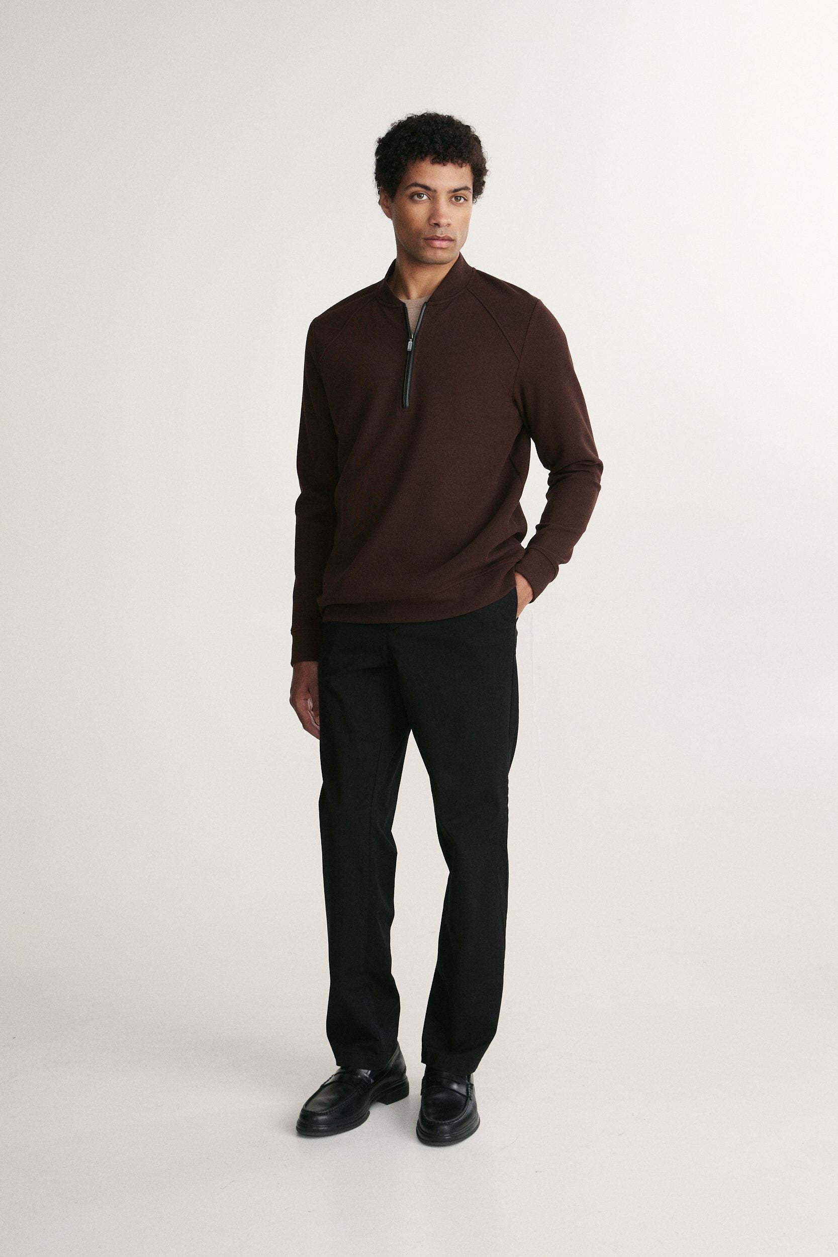 Textured half zip mockneck sweater