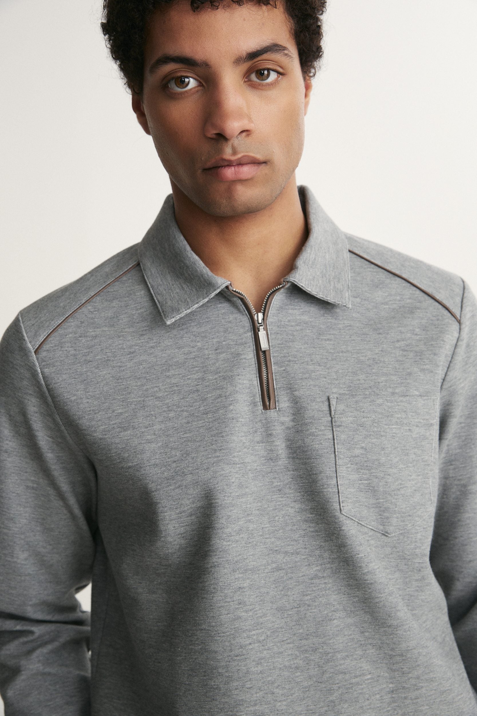 Long sleeve polo half zip with pocket