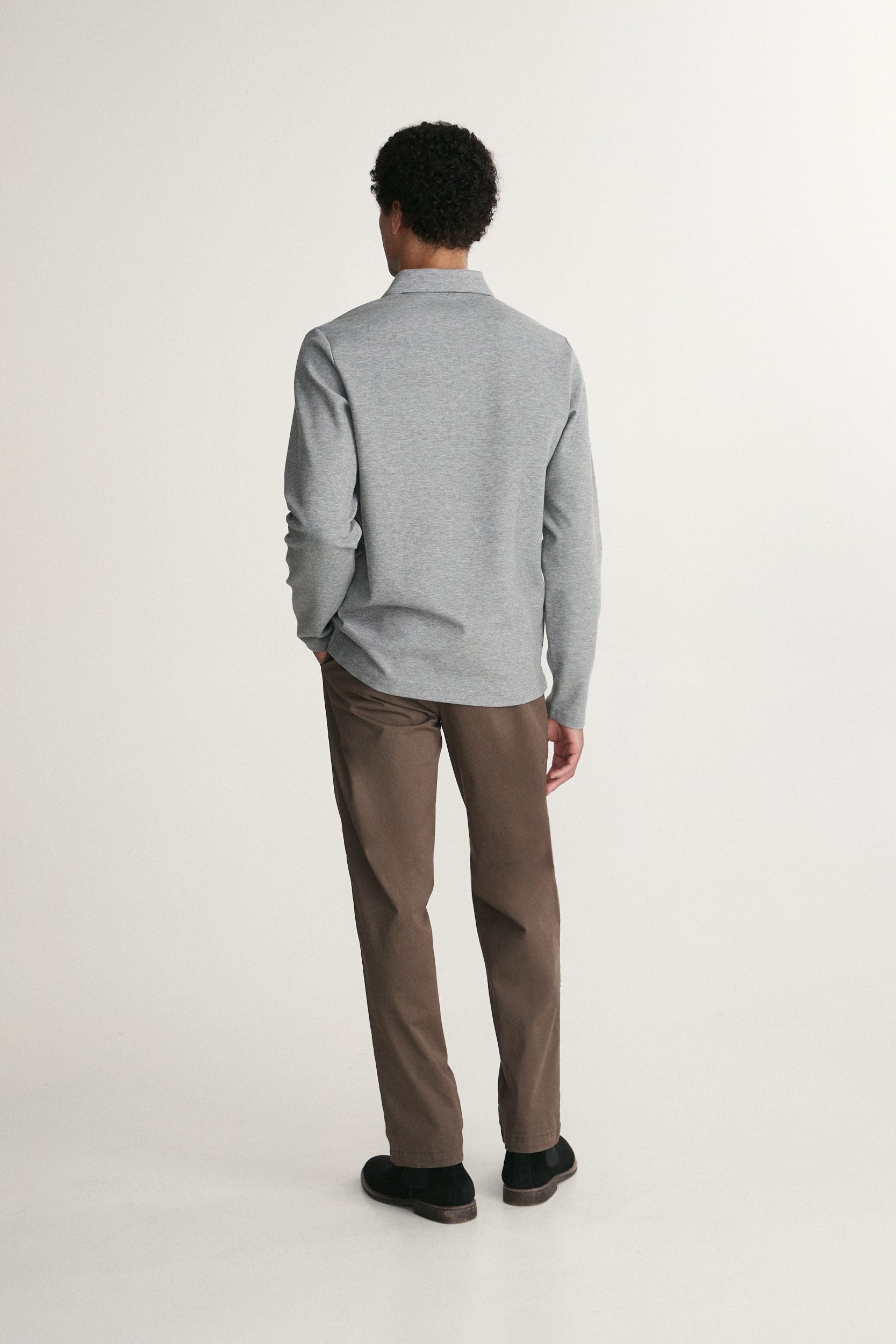 Long sleeve polo half zip with pocket