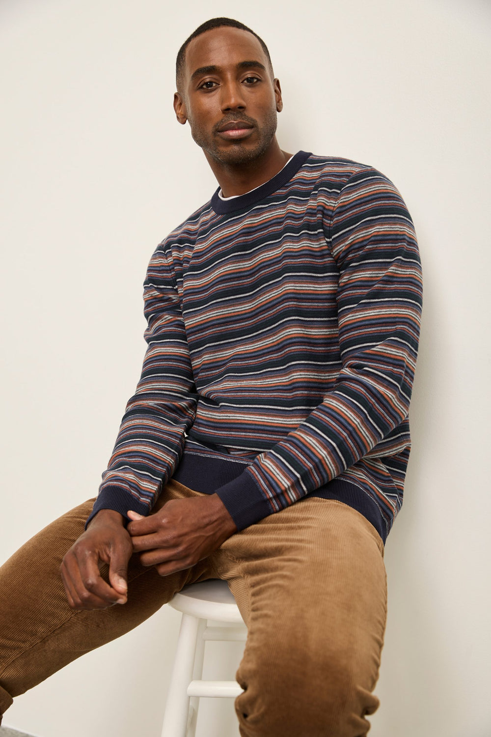 Reverse knit striped sweater