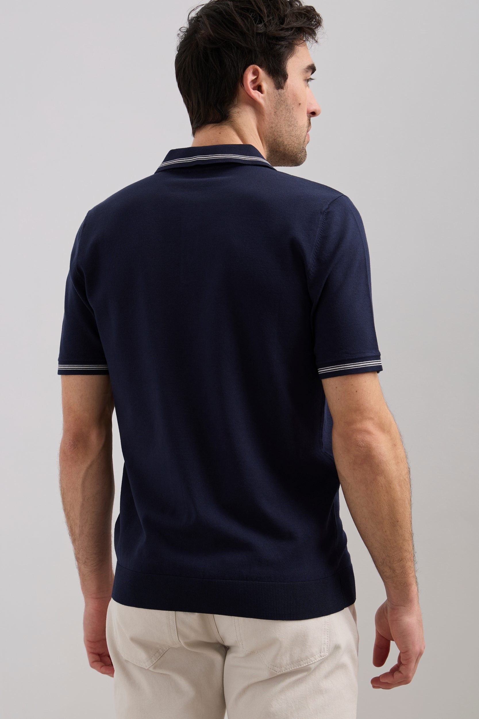 Polo tricot détails contrastés