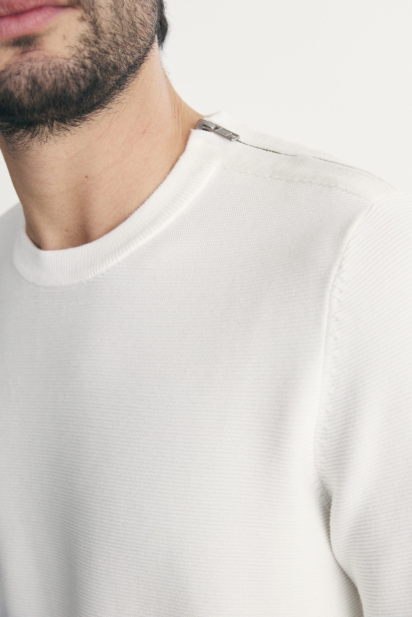 Sweater with shoulder zipper