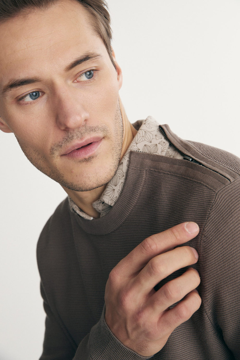 Sweater with shoulder zipper