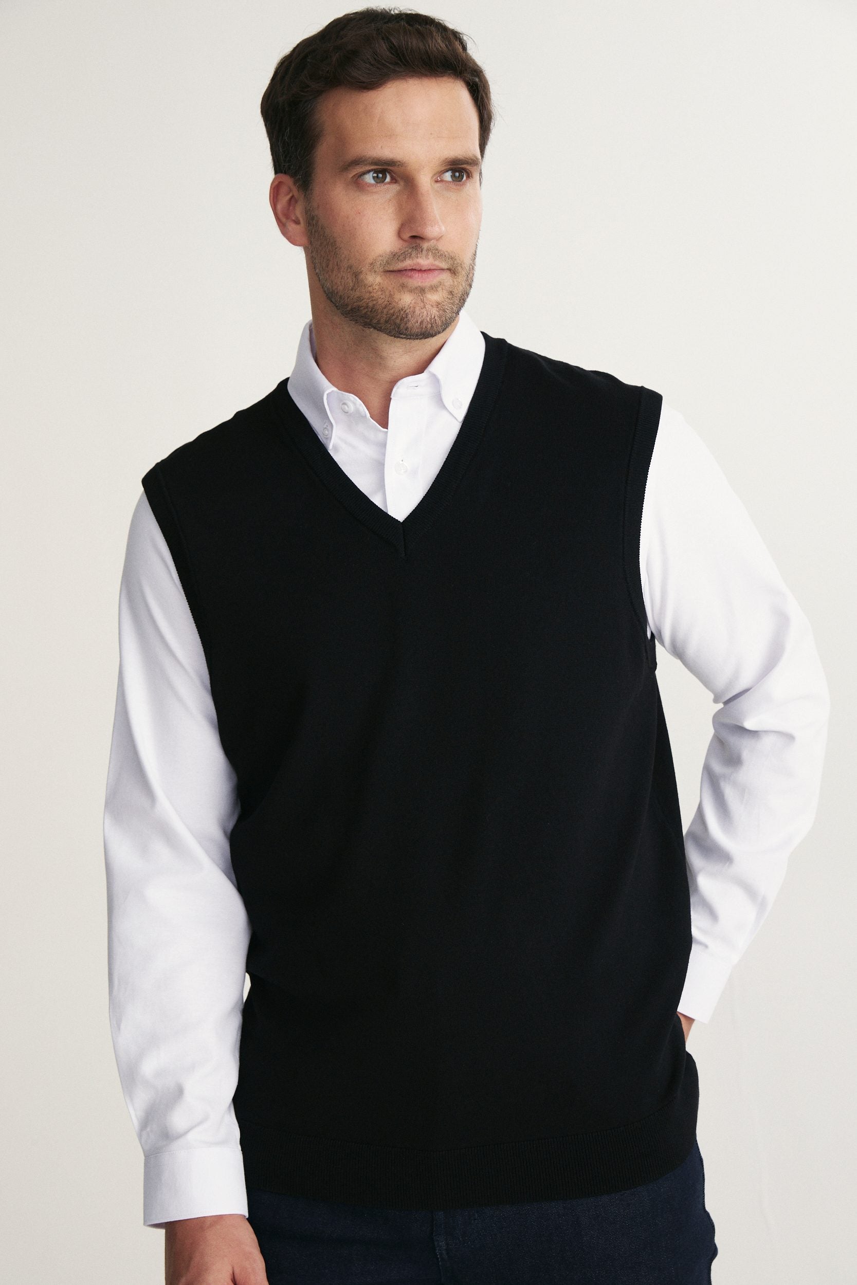 Solid colour sleeveless vest