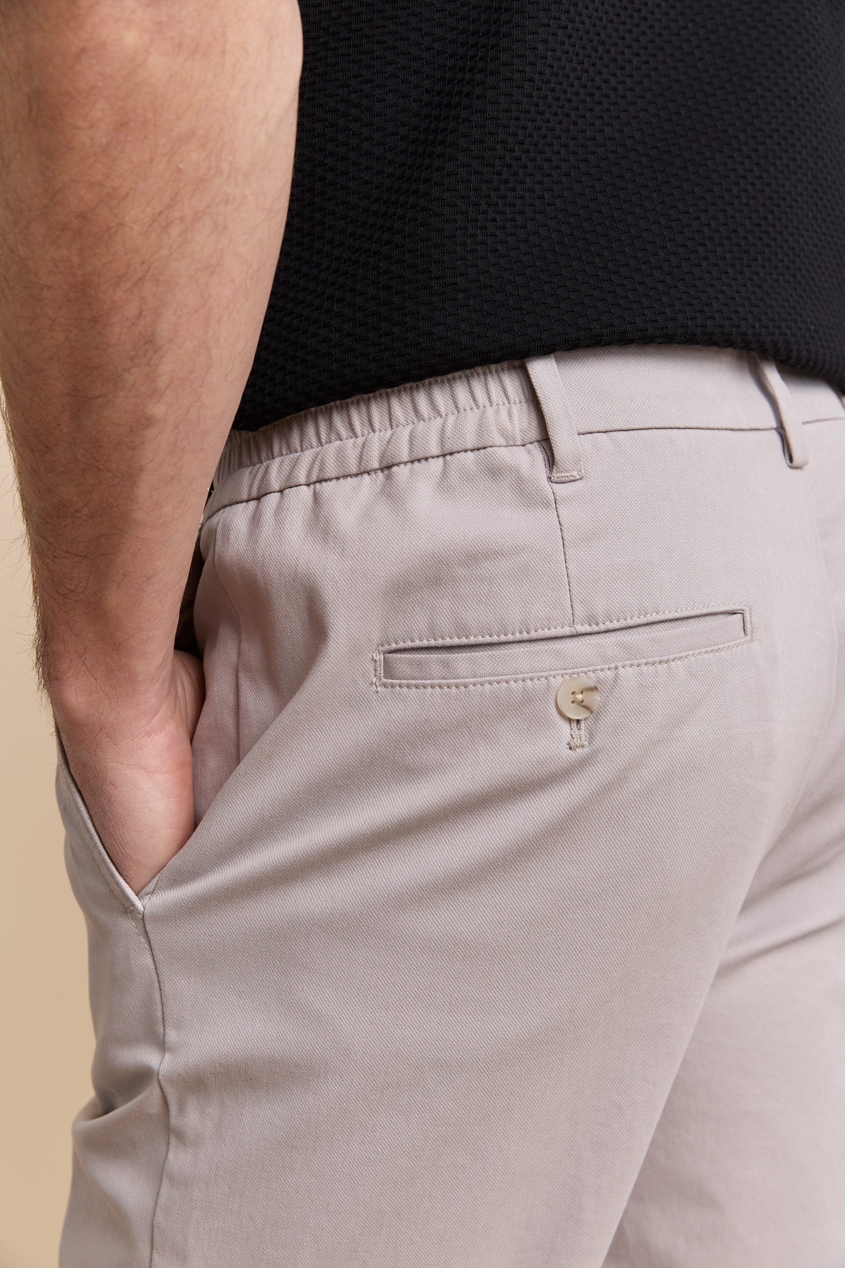 Pantalons à plis à côté élastique