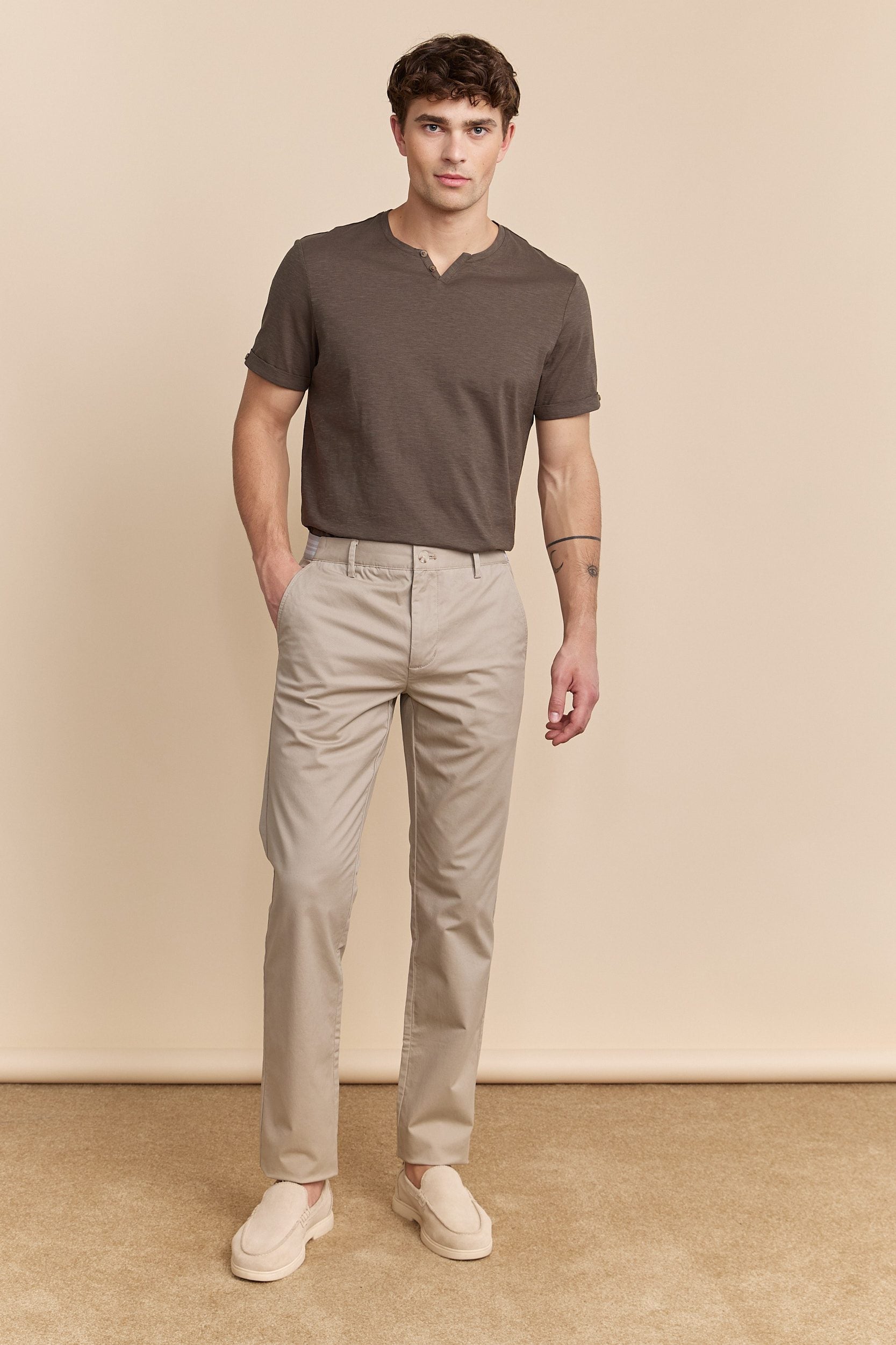 Slim fit pants with elastic sides