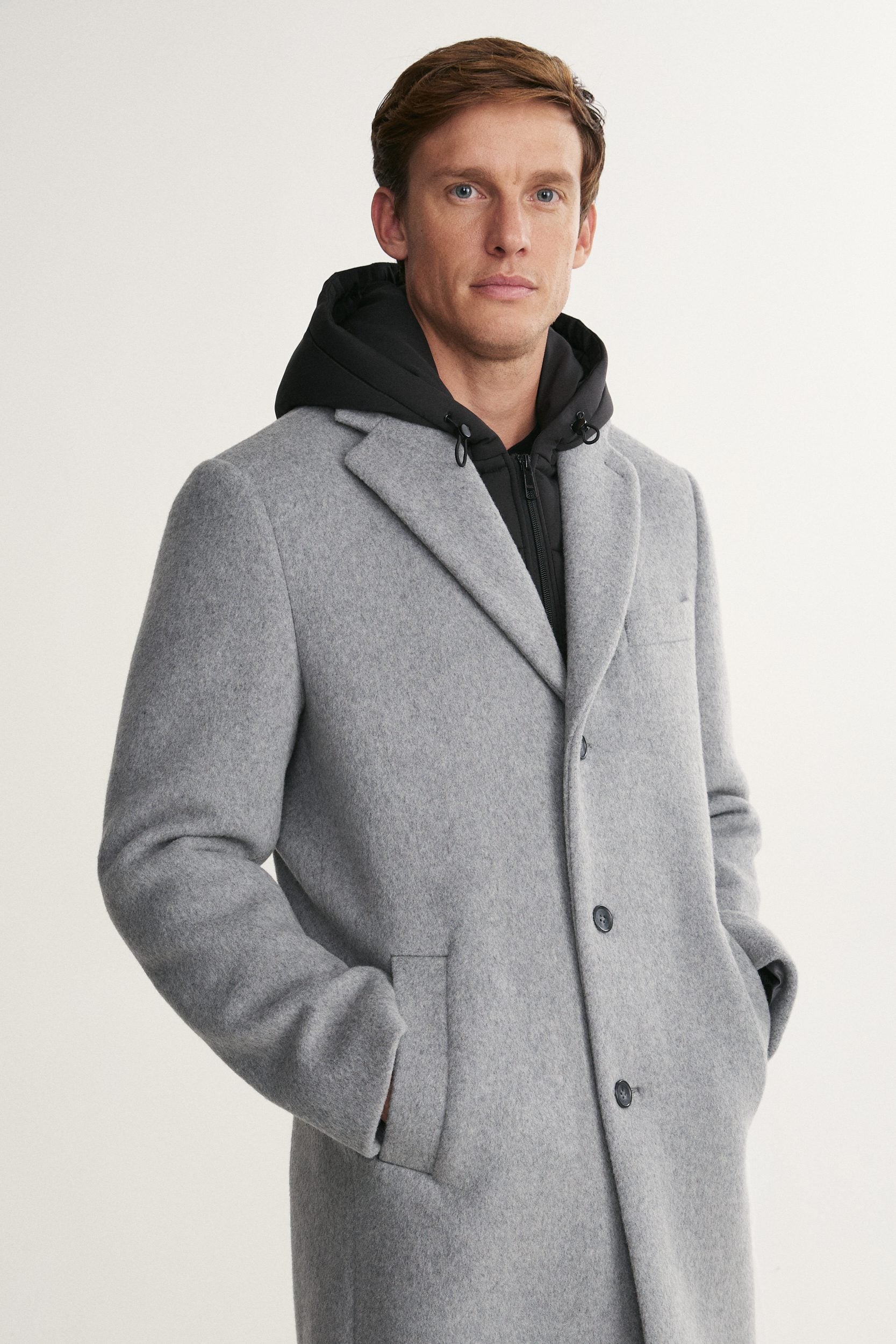 Manteau avec empiècement et capuchon amovible