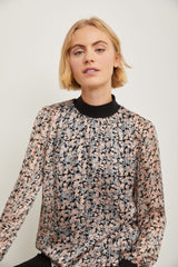 Fluid printed blouse with rib finishing