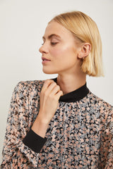 Fluid printed blouse with rib finishing