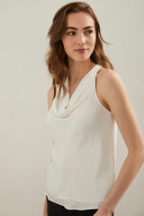 Sleeveless top with draped col