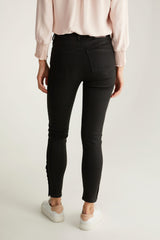 Pantalon slim taille haute enduit