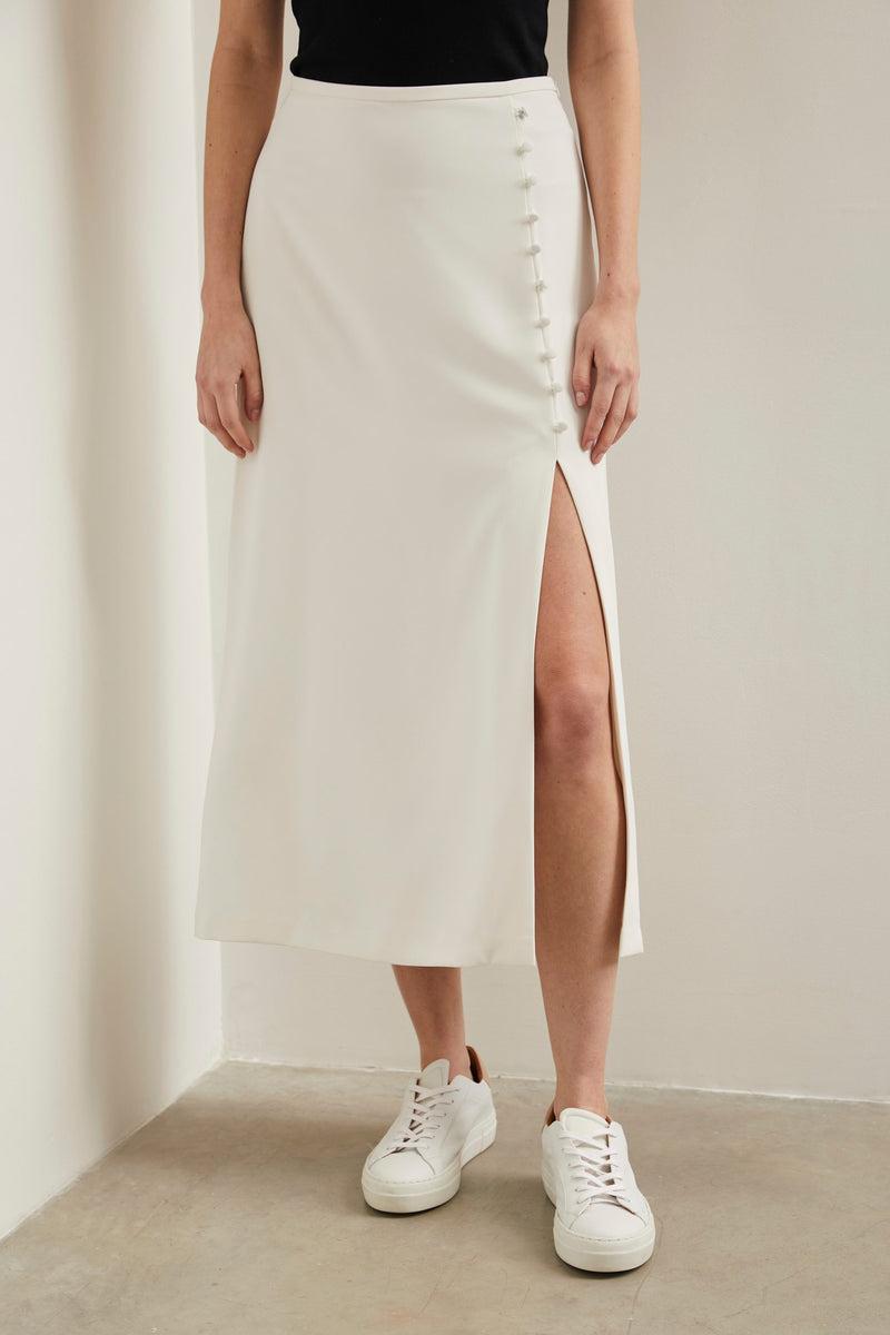 Long flared skirt with front slit