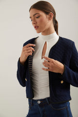 Veste stretch matelassée avec poches appliquées