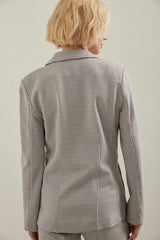 Fitted stretch blazer with applied pockets